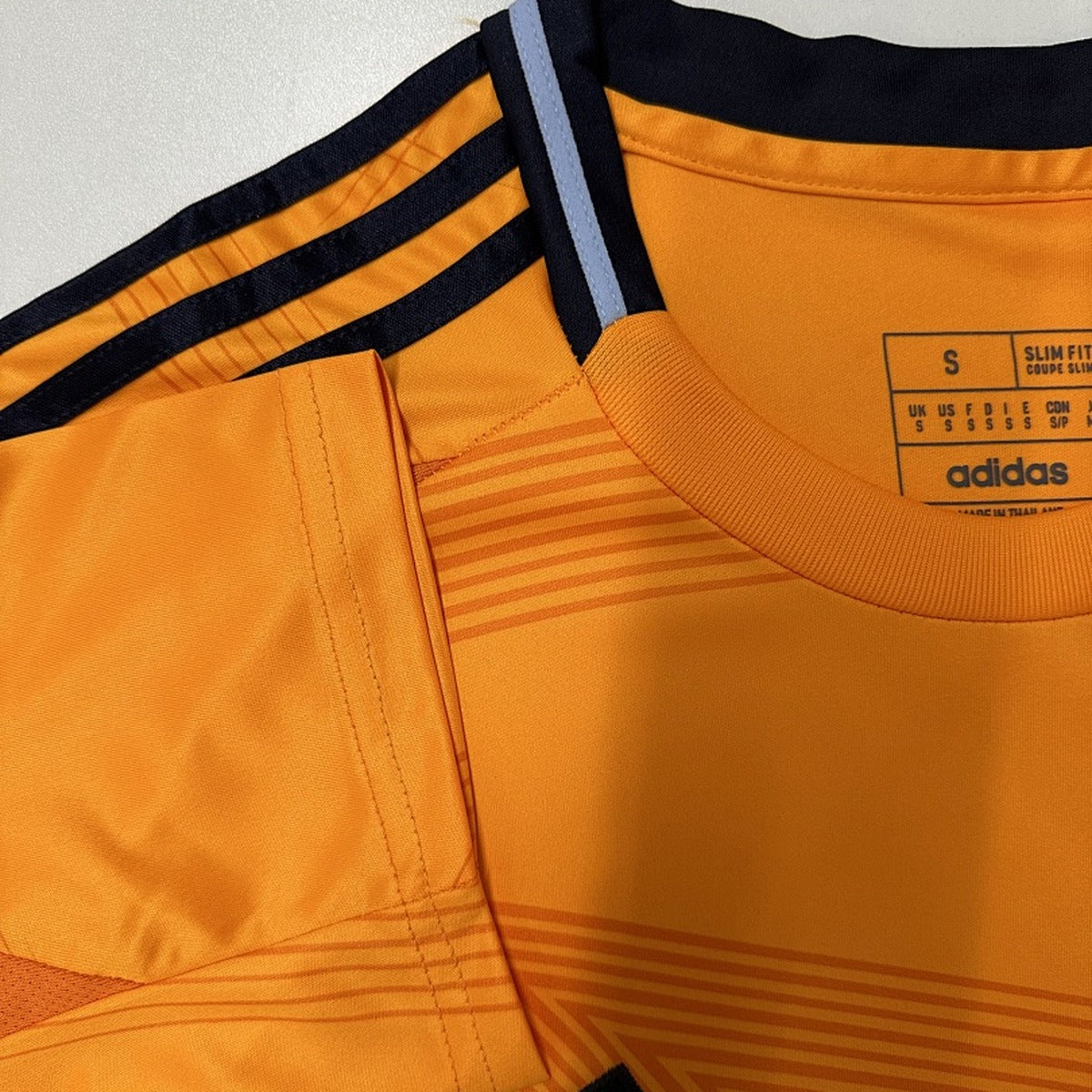 Jersey Real Madrid 2024-25 Visitante naranja, foto 6 de 6
