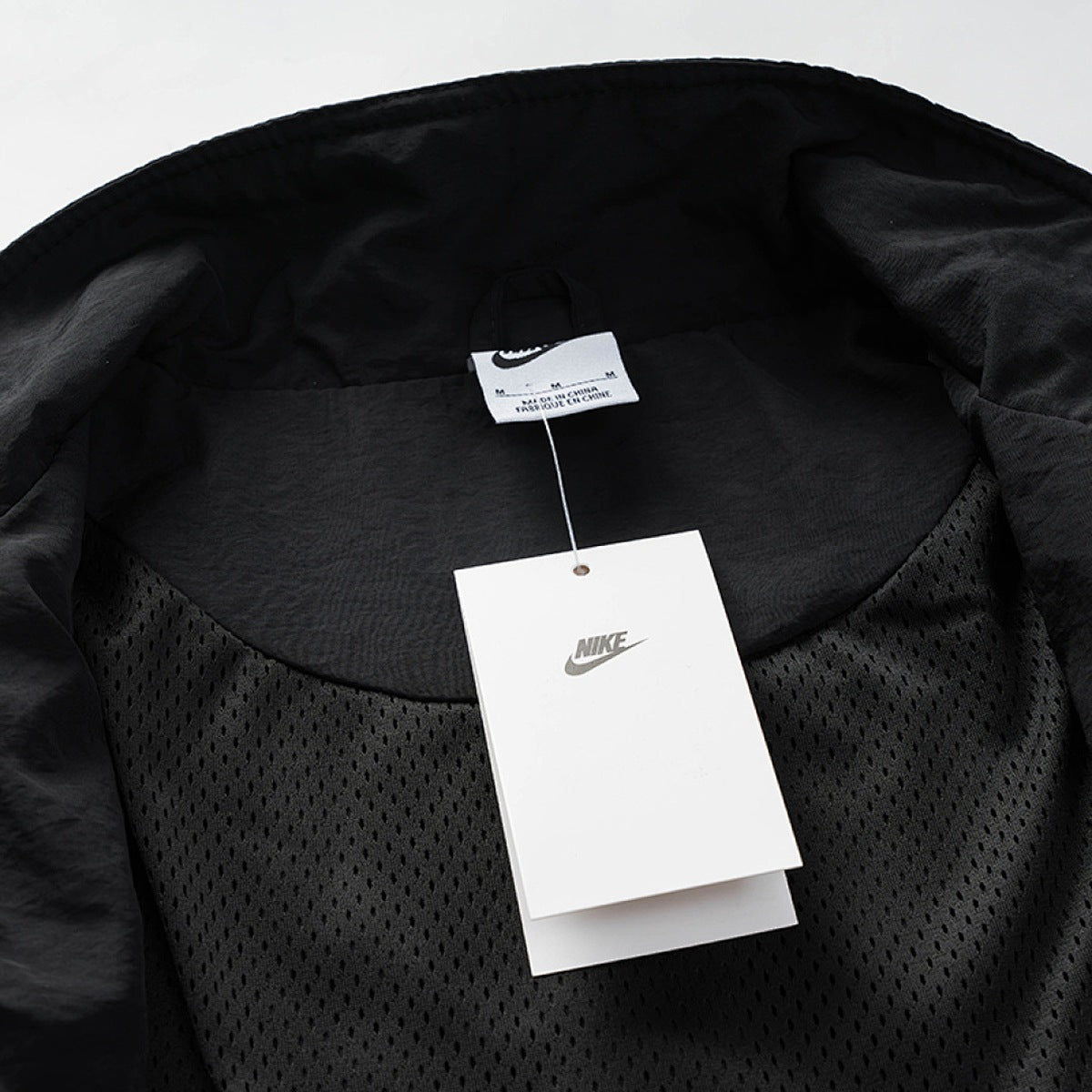 Conjunto Nike Cortavientos Swoosh, foto 8 de 27