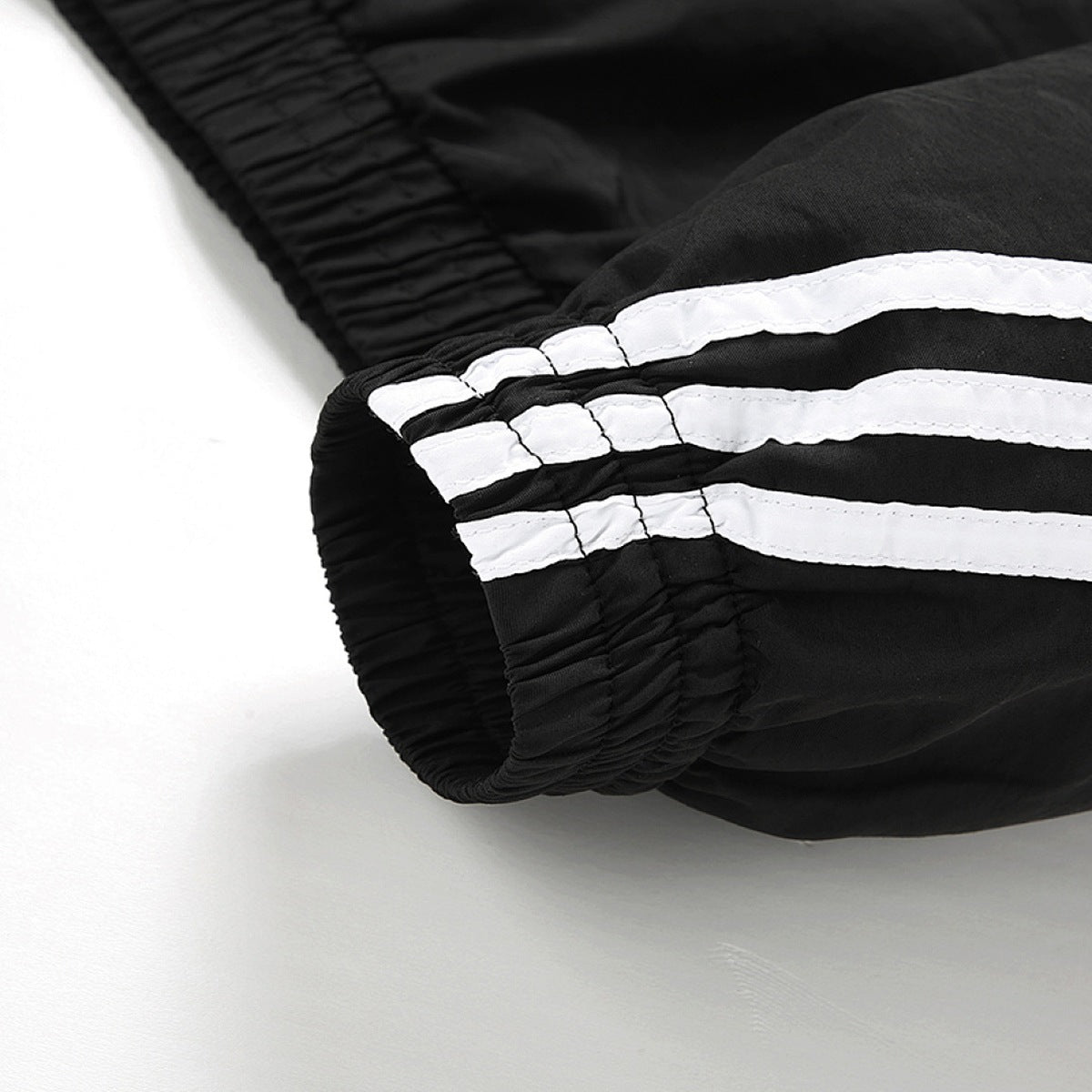 Conjunto adidas Taslan Tres Franjas, foto 7 de 10