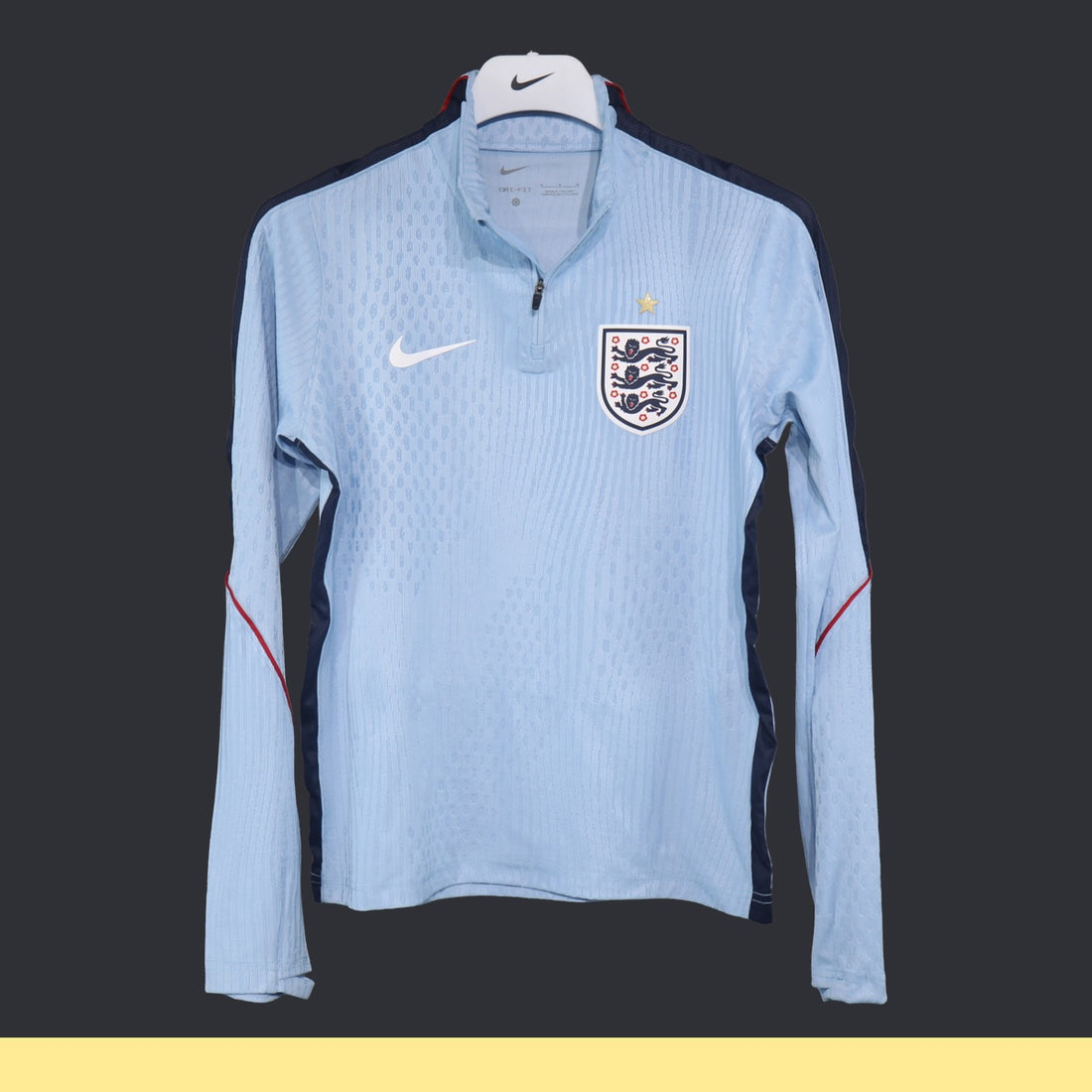 Top de Entrenamiento Medio Cierre Inglaterra Nike 2026 Azul, foto 1 de 6