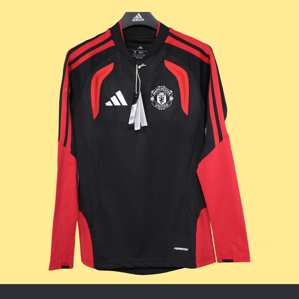 Top de Entrenamiento Medio Cierre Manchester United adidas 2026 Negro, foto 1 de 4