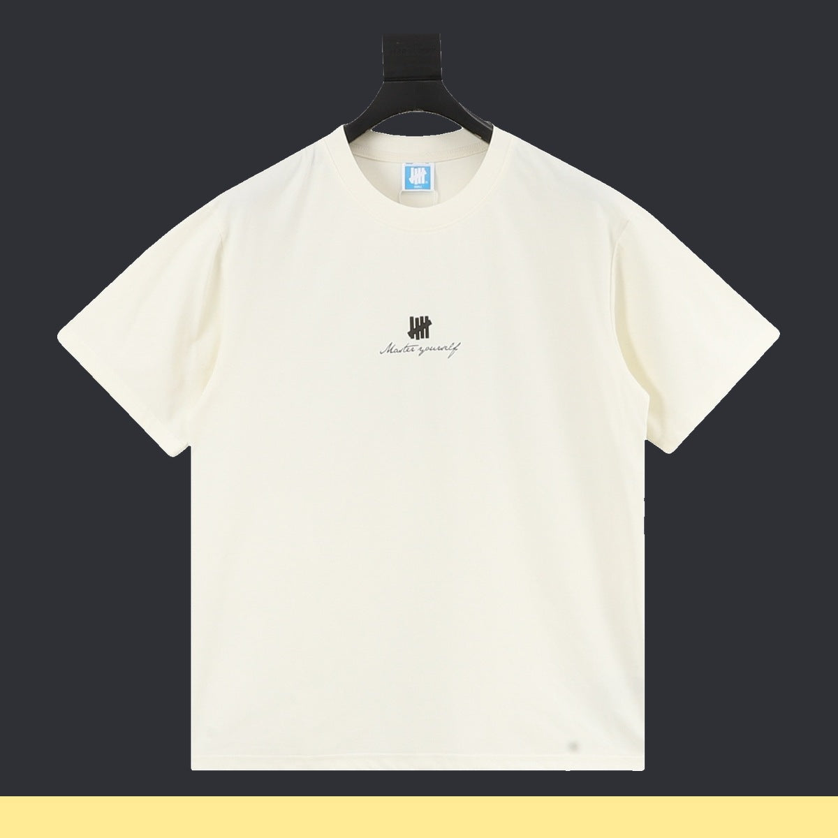 Playera Undefeated Beige, foto 1 de 8