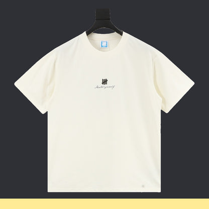 Playera Undefeated Beige, foto 1 de 8