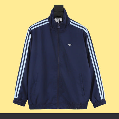 Chamarra adidas adicolor Azul marino, foto 1 de 9