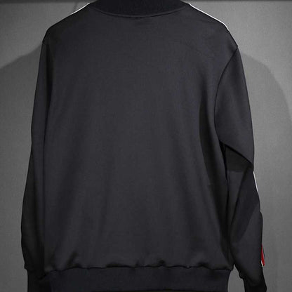 Conjunto Manchester United adidas Clásico Retro Negro, foto 10 de 15