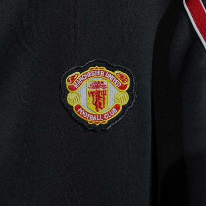 Conjunto Manchester United adidas Clásico Retro Negro, foto 13 de 15