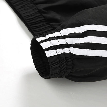 Conjunto adidas Taslan Tres Franjas, foto 7 de 10