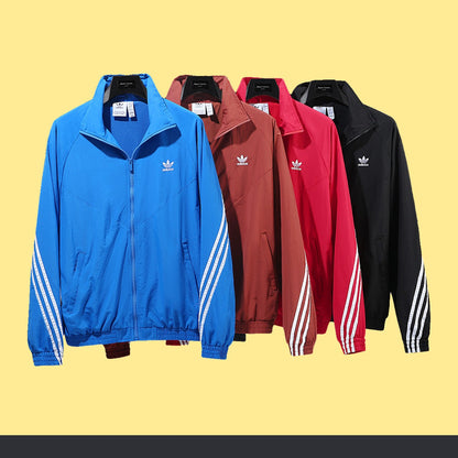 Conjunto adidas Taslan Tres Franjas, foto 1 de 10