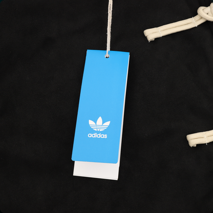 Chamarra adidas Tang Año Nuevo Chino negra, detalle de la etiqueta